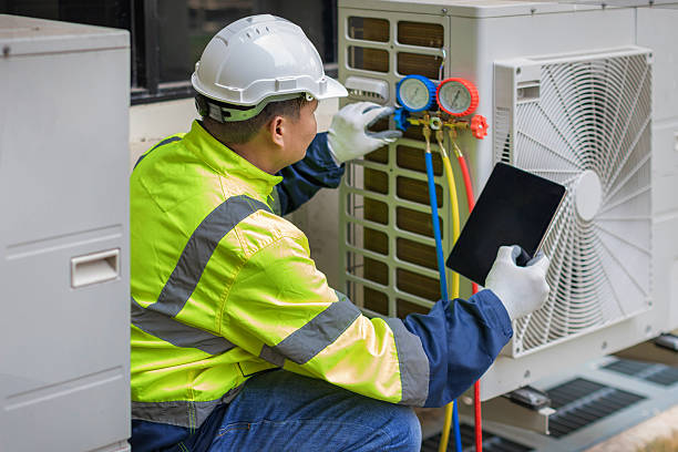 Professional Air Duct Cleaning technician working in Conestee, SC
